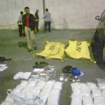Dua kantong mayat berisi jasad kurir narkoba yang ditembak petugas BNN saat penggerebekan gudang narkoba di Kosambi, Tangerang. foto: okezone