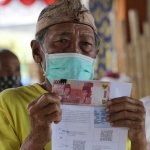 Ilustrasi penerima bantuan sosial.