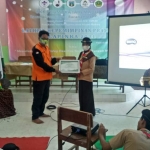 Supervisor BPBD Kabupaten Pamekasan saat memberikan pelatihan penanggulangan bencana kepada adik-adik pramuka.