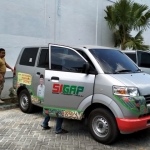 Mobil Sigap yang sedang terparkir di samping Kantor Kejari Pamekasan.