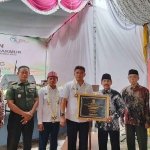 BUMDes Sumber Makmur milik Desa Burneh, Bangkalan, saat launching program Desa Berdaya 2023 di Jalan Raya Tangkel, area Suramadu.