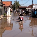 Kondisi genangan air di salah satu desa di Tanggulangin.