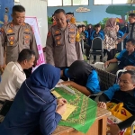 Pengobatan gratis untuk disabilitas yang digelar Polres Pasuruan.