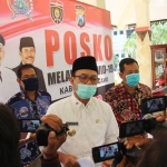 Ketua Gugus Tugas Penanganan Covid 19 Budi Sulistyono saat memberikan keterangan pers.