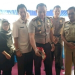 Kapolres usai pengguntingan pita.