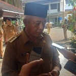 Bupati Malang, H.M Sanusi, saat memberi keterangan kepada awak media.