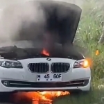 Mobil BMW putih yang terbakar di Ketapang Daya, Sampang