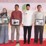 Plt. Wali Kota Pasuruan, Raharto Teno Prasetyo, S.T. membuka kegiatan penyerahan Program NUSP-2 tahun anggaran 2019.