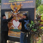 Tugu PSHT di Dusun Lebak Tumpang yang rencananya akan diganti dengan tugu Pancasila. Foto: Ist