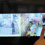 Pemilik toko saat menunjukkan rekaman CCTV saat pelaku beraksi melakukan pencurian.