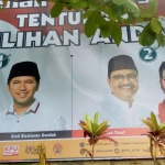 Baliho kedua pasangan calon Gubernur dan Wakil Gubernur mulai dipasang di sejumlah titik..
