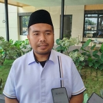 Kasatreskrim Polres Jombang, AKP Dimas Robin Alexander, saat memberi keterangan terkait penemuan mayat di ladang jagung ke awak media.