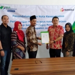 Penandatanganan MoU antara BPJamsostek dengan Bawaslu, Kamis (12/3/2020).