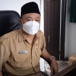 Kepala Bidang SMP Dispendik Jember, Nur Hamid, di ruang kerjanya.