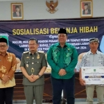 Pj Bupati Pasuruan bersama asisten 1 bidang pemerintahan.