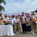 Bupati Gresik, Fandi Akhmad Yani, saat memberi sambutan di acara tasyakuran HUT Gerindra ke-14. Foto: SYUHUD/BANGSAONLINE