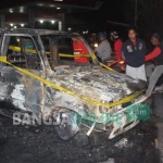 Kondisi mobil yang hangus usai dilalap api.