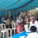 Vaksinasi Covid-19 yang digelar di kawasan Stal Pandegiling Surabaya. (foto: ist)