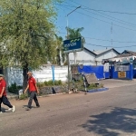 Buruh pabrik PT SGS Jombang.