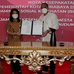 Wali Kota Surabaya Eri Cahyadi usai melakukan penandatanganan nota kesepakatan bersama BPJS Kesehatan Kantor Cabang Surabaya. (foto: ist)