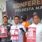 Para petugas dari Polresta Malang Kota saat menggelar konferensi pers terkait penangkapan drivel ojol yang menjadi kurir narkoba.