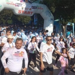 Suasana Fun Colour Run yang digelar Polres Jember.