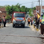 Salah satu perlintasan KA yang ada di Madiun.