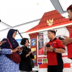 Anggota KIM Mesem sedang menyampaikan informasi kepada masyarakat.