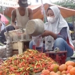 Pedagang cabe rawit merah di Pasar Raya Mojoagung.