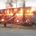 Api membakar beberapa bagian stadion.