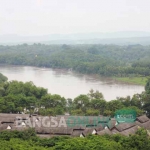 Tampak air Sungai Bengawan Solo di wilayah Bojonegoro mulai menunjukkan kenaikan sejak Kamis (2/2) pagi. foto: EKY NURHADI/ BANGSAONLINE