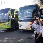 Deretan bus yang mengangkut peserta Program Balik Gratis dari Pemkot Madiun, tahun lalu.