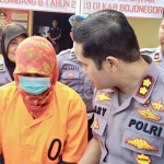 SN (50) warga Kabupaten Jombang, salah satu terangka judi saat diinterogasi Kapolres Bojonegoro AKBP Ary Fadli.