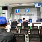 Pelayanan di kantor BPJS Kesehatan cabang Madiun.

