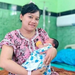 Warga Desa Grobogan, Kecamatan Jiwan, Kabupaten Madiun, Erna (28), sebagai peserta program JKN atau Jaminan Kesehatan Nasional yang diselenggarakan BPJS Kesehatan.