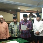 Wakil Wali Kota Pasuruan Raharto Teno Prasetiyo membacakan pernyataan islah.