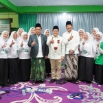 KH Mujib Imron (pakai jas) bersama Ketua Umum PKB Muhaimin Iskandar (tengah) dan Ketua DPC PKB Pasuruan Irsyad Yusuf.