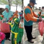 Para siswa baru SD BAS Tuban membersihkan sekaligus memilah sampah organik dan anorganik di tepian Pantai Mangrove Jenu, Minggu (31/7/2022).