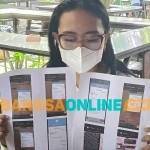 Salah satu korban arisan bodong di Kota Kediri saat menunjukkan bukti transaksi. Foto: MUJI HARJITA/BANGSAONLINE