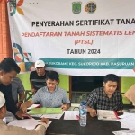 Penyerahan sertifikat program PTSL di Kabupaten Pasuruan.