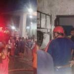 Petugas saat melakukan pembasahan sisa-sisa api.