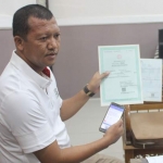 Kepala Dispendukcapil Pasuruan Yudha Tri Widya Sasongko saat ditemui di kantornya.