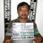Kiran, pemilik 140 sak pupuk yang diamankan polisi karena hendak menjualnya ke Bojonegoro dari Kediri. foto: ROMZA/ BANGSAONLINE