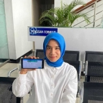 Dewi Ayu Kartika Ganesti (22), warga Kediri yang terdaftar sebagai peserta JKN segmen PBI.
