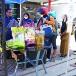 Pasanganmu atau akronim dari pasar pangan murah yang digelar PT JGU.