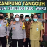 Kapolresta Sidoarjo Kombespol Sumardji foto bersama usai menginisiasi pembentukan kampung tangguh.