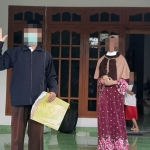 K dan istrinya gembira bisa kembali berkumpul di rumah.