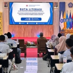 Ketua PWI Kabupaten Tuban, Suwandi, saat memberikan sambutan di hadapan tamu undangan dan peserta Duta Literasi 2026.