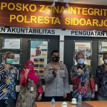 Kanwil DJP Jatim II saat mengunjungi Polresta Sidoarjo. Foto: Ist