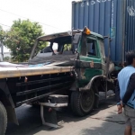 Kondisi dua truk trailer sebelum dievakuasi.